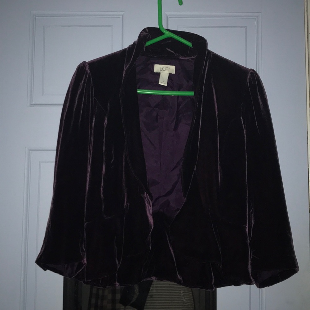 purple jacket with gem buttons